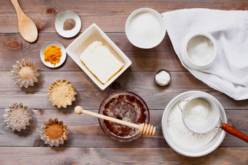Ingredients for traditional gingerbread on the rustic wooden table