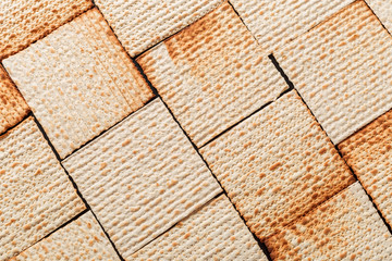 Texture of jewish passover matzah (unleavened bread). Symbol of jewish passover.