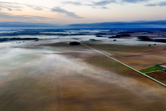Misty morning in latvian countryside. © Janis Smits