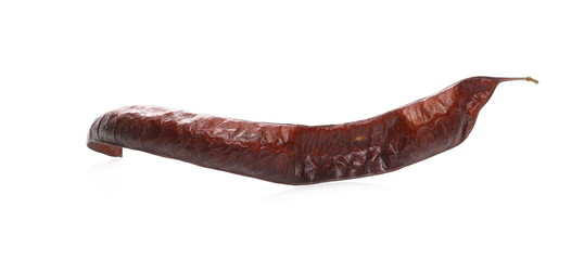 Dry acacia seeds isolated on white background