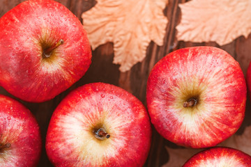 Harvest of ripe apples variety Red Delicious. Food background, top view, flat lay.