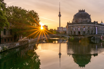 Bode Museum with the Berlin Fernsehturm in the background during sunrise