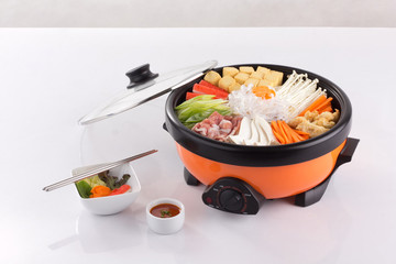 Sukiyaki pot with vegetable and pork isolated