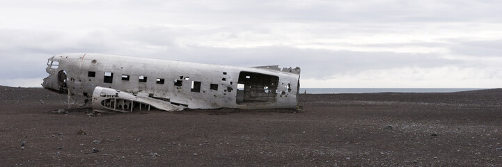 Plane wreck in Iceland at a cloudy day with no people