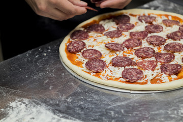 cooking pizza chef in the kitchen