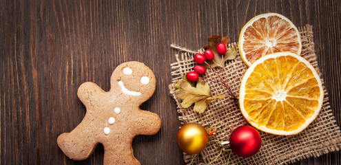 Fototapeta na wymiar gingerbread Christmas and gifts on table
