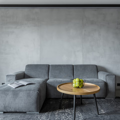 Gray sofa and round table