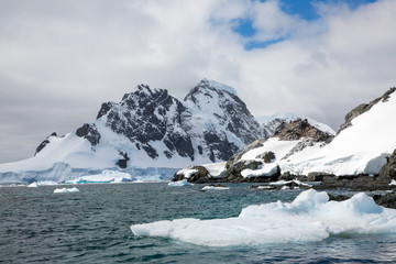 Fototapeta na wymiar ice in the Antarctica with iceberg in the ocean