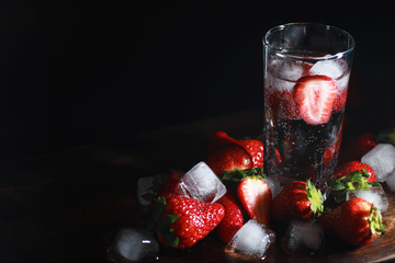 Fresh ripe strawberries on a wooden table