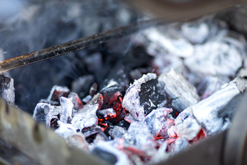 Close-up of burning charcoal in the grill