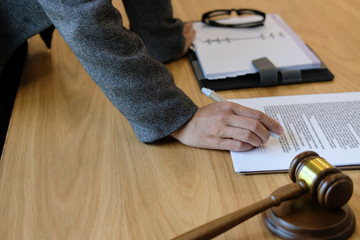 businesswoman read contract. woman considering mortgage loan document.