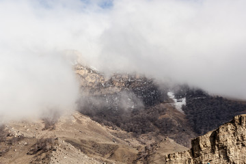 beautiful winter mountains of the Kavkaz in the clouds