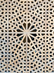 Wooden islamic pattern on a window at Shah mosque, Isfahan, Iran