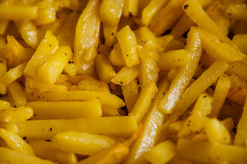 The potato is fried in a frying pan