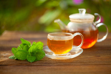 delicious green tea in a beautiful glass bowl on table