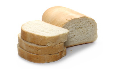 Bread loaf with slices isolated on white background