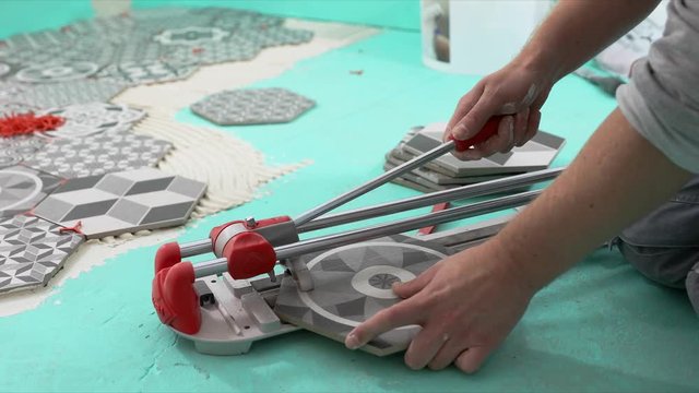 tiler cutting tile with cutter