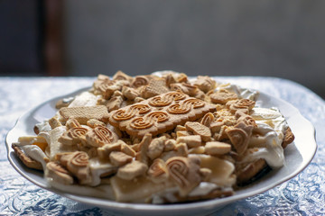 homemade cookies on a plate on a table top view.