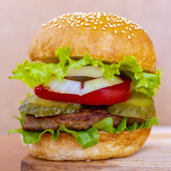 Burger on a wooden board