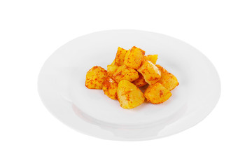 Potatoes diced fried, baked with spices, side dish on a plate on white isolated background Side view. Appetizing dish for the menu restaurant, bar, cafe