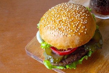Burger on a wooden board