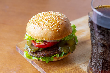 Burger on a wooden board