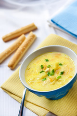Cheese soup with chicken, potatoes and turmeric