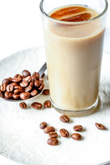 coffee with ice in glass on white background