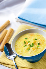 Cheese soup with chicken, potatoes and turmeric
