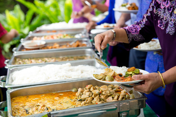 Food Buffet Catering Dining Eating Party Sharing Concept.people group catering buffet food indoor in luxury restaurant with meat colorful fruits and vegetables