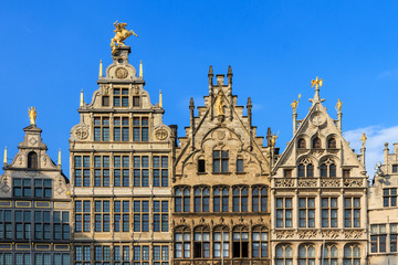 Fototapeta na wymiar Beautiful historic facades of the manor houses at the Great Market square (Grote Markt) in Antwerp, Belgium, in summer against a blue sky