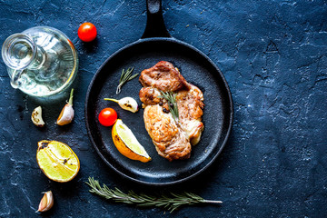 concept cooked steak on dark background top view