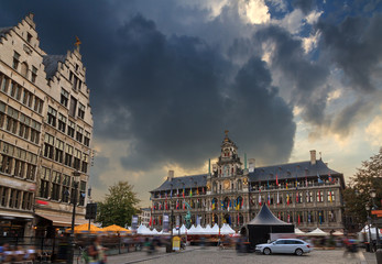 Ominous clouds Antwerp city hall at the great market square (Grote Markt) in Belgium on a stormy summer day

