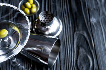 martini cocktail at wooden background close up