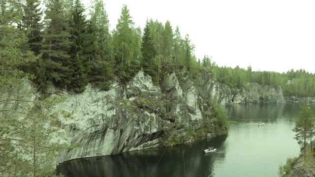 Ruskeala, Sortavala, Russia, September: Famous marble cayon in Karelia - old marble quarries production site - Ruskeala park - natural landmark, tourist destination.