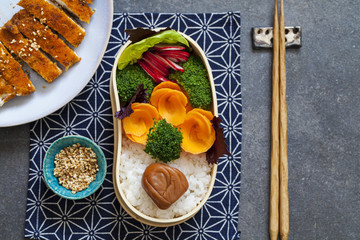 Japanese style  lunch with onigiri rice balls and crispy chicken