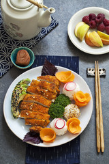 Japanese style  lunch with onigiri rice balls and crispy chicken