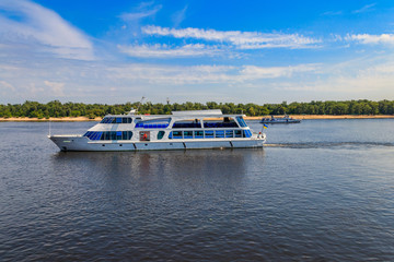 Fototapeta na wymiar Tourist ship sailing on the Dnieper river in Kiev