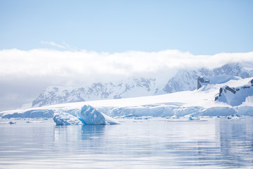 ice in the Antarctica with iceberg in the ocean