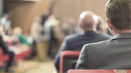 People in a Room for a Seminar