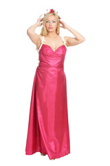 Portrait of beautiful woman in pink dress posing