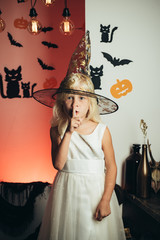 Shhh, Shh. Secret and gift Childrens costumes for the celebration of Halloween. Happy laughing kid...