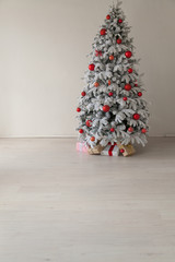 Christmas decoration Christmas tree with presents in white