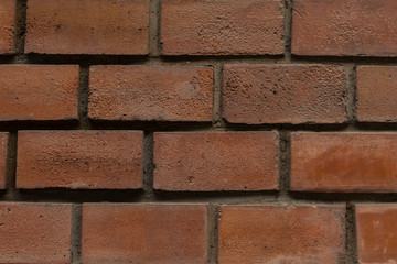 horizontal masonry red brown stone industrial background symmetrical pattern base fragment of the fort tower