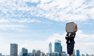 Business woman with old TV instead of head.