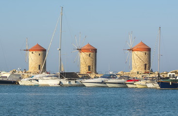 Windmills in Mandraki harbor, Rhodes island, Greece
