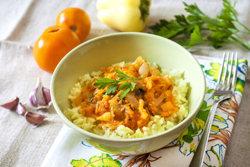 Steamed rice with stewed vegetables and turmeric
