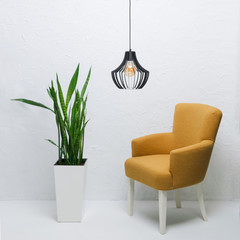 Composition of furniture and lamp on a light background