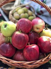 Fresh ripe red apples in a basket