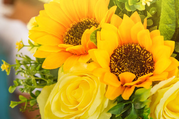 Bright and beautiful colors of plastic flowers.